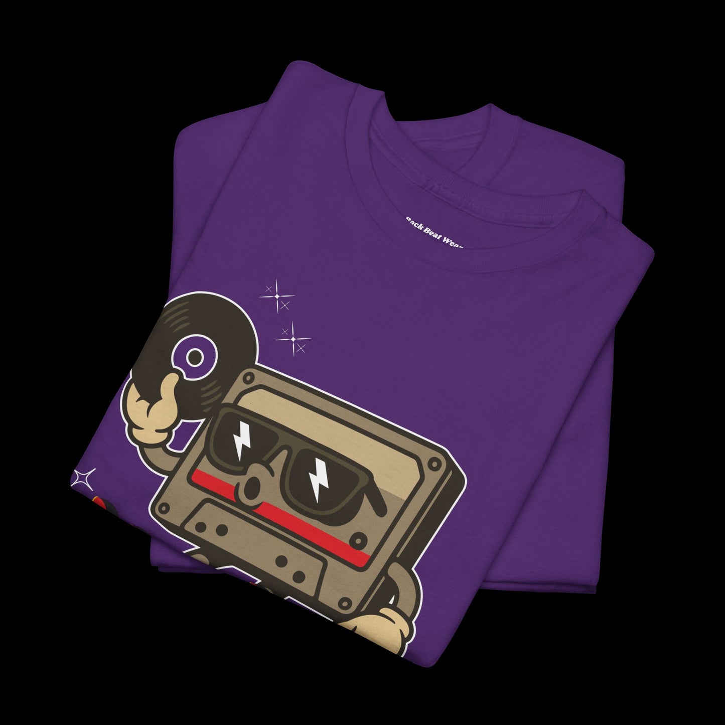 Folded purple t-shirt with a cassette tape graphic on a black background