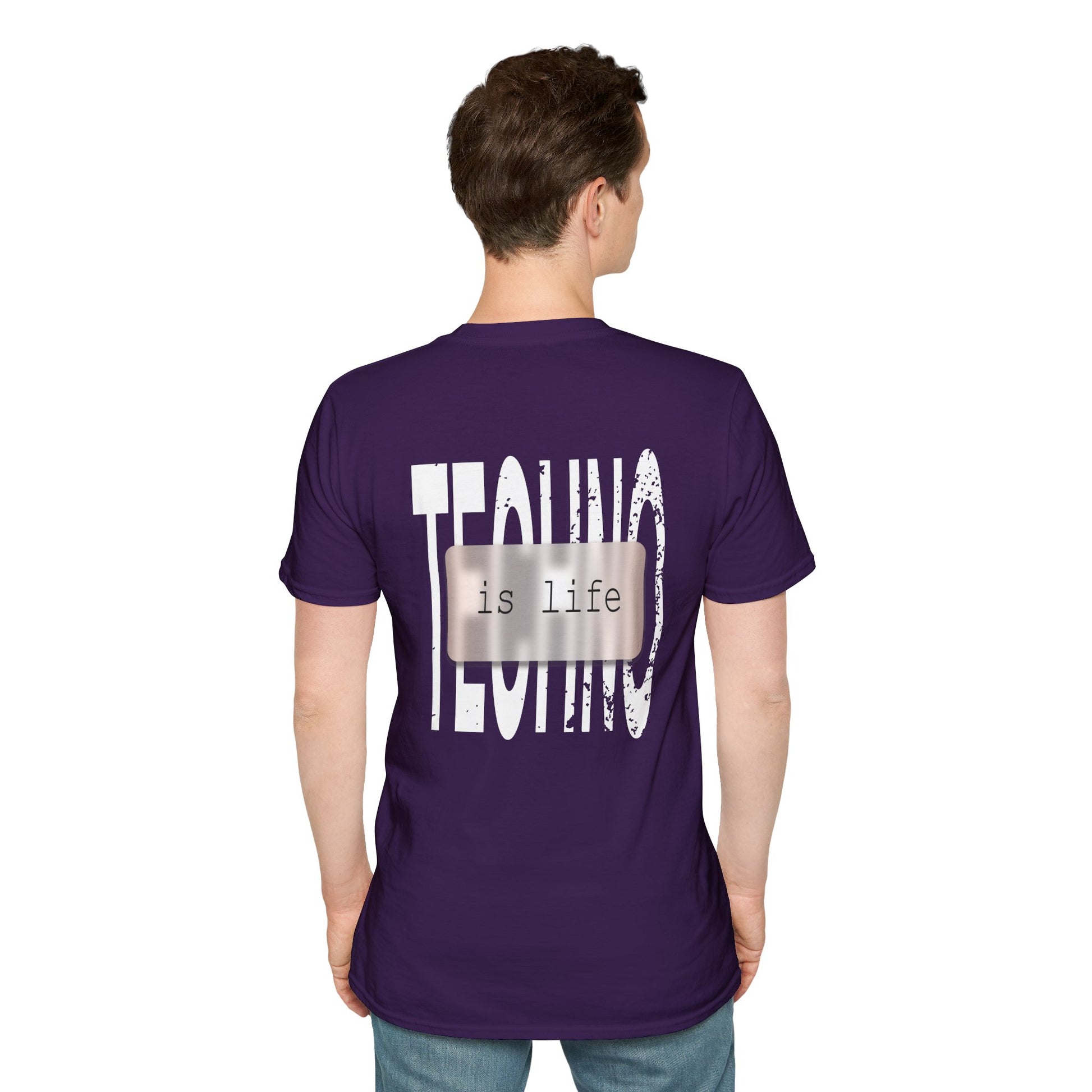 A purple t-shirt featuring bold white typography that reads "TECHNO is life," designed for electronic music fans and rave streetwear enthusiasts.