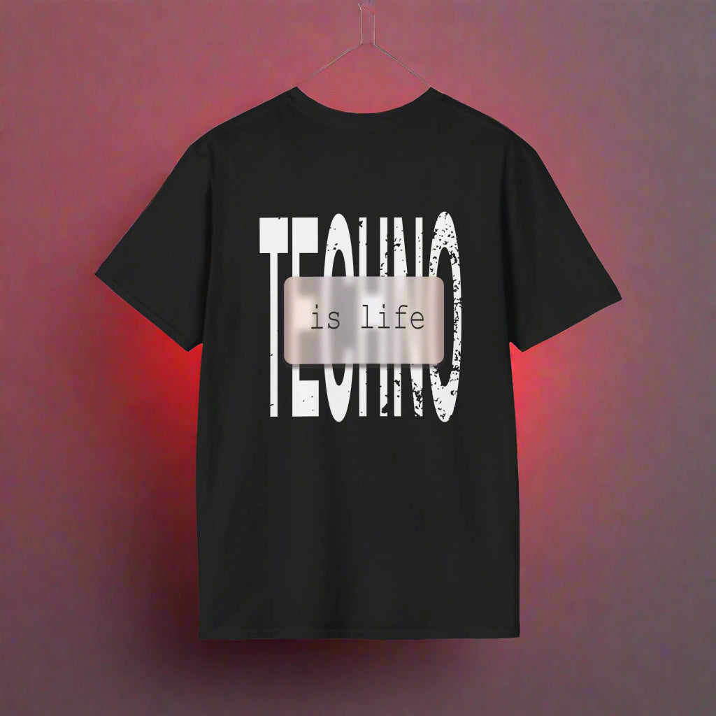 A black t-shirt featuring bold white typography that reads "TECHNO is life," designed for electronic music fans and rave streetwear enthusiasts.