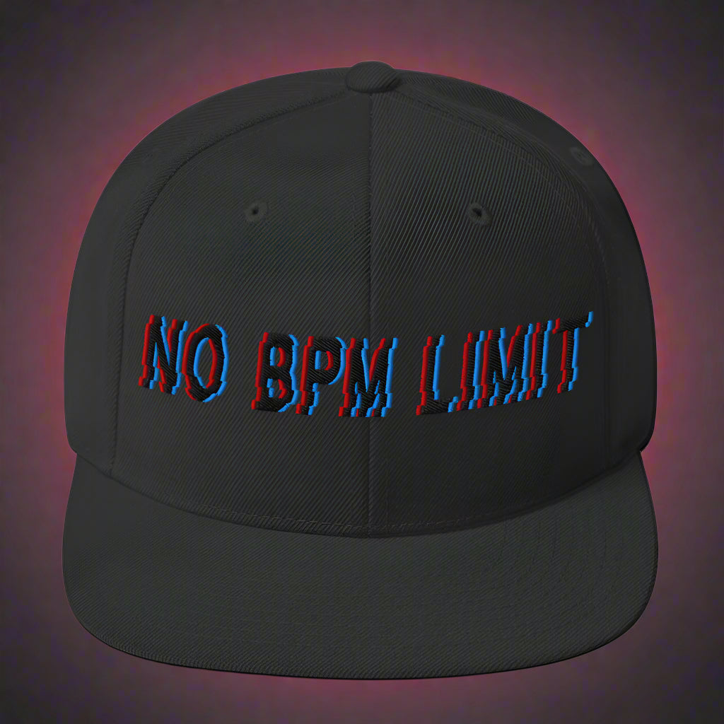 A black snapback cap with bold glitch-style "No BPM Limit" embroidery in red and blue, designed for electronic music fans and streetwear enthusiasts.