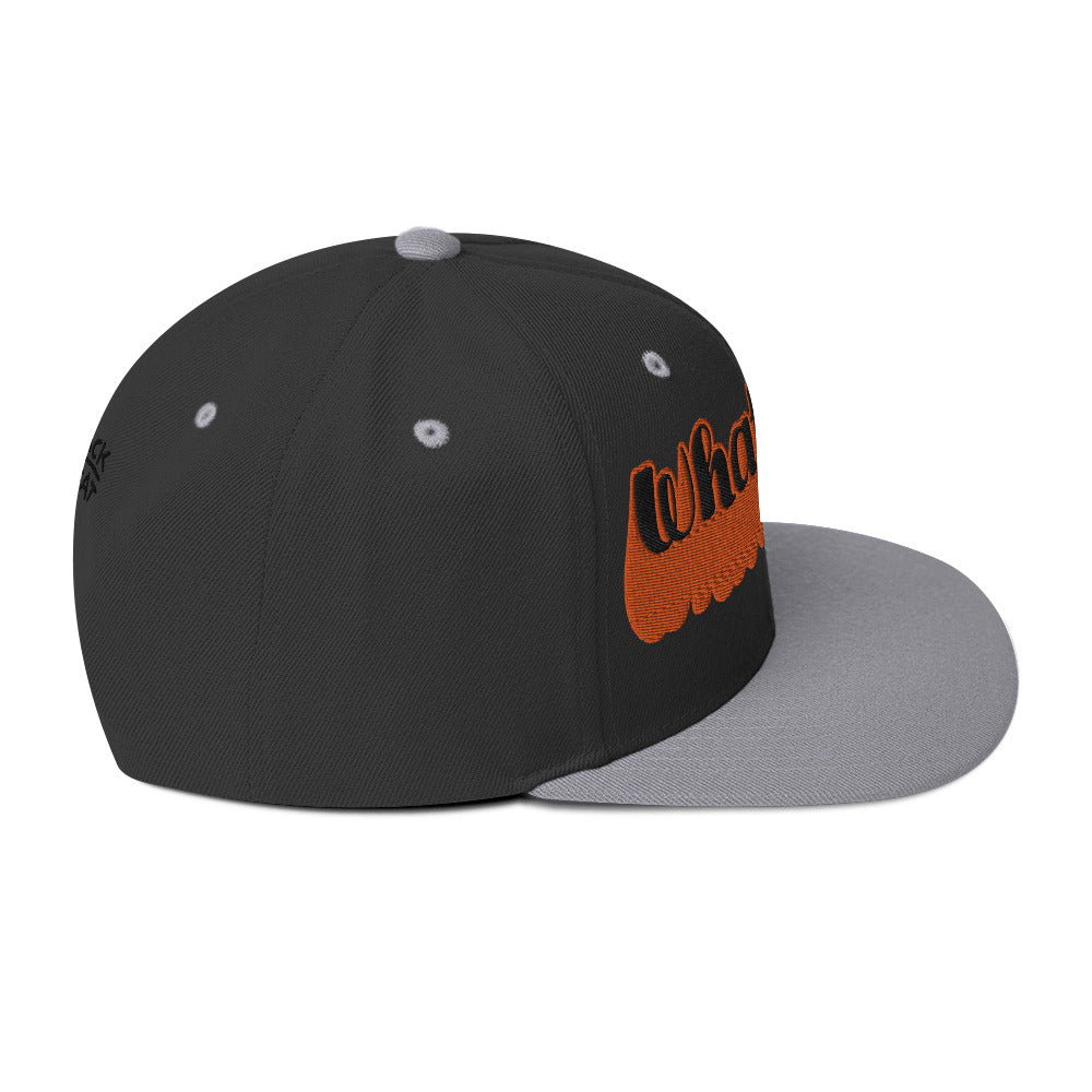 "Whatever" Snapback Hat in silver with bold orange embroidered text, perfect for streetwear fashion.