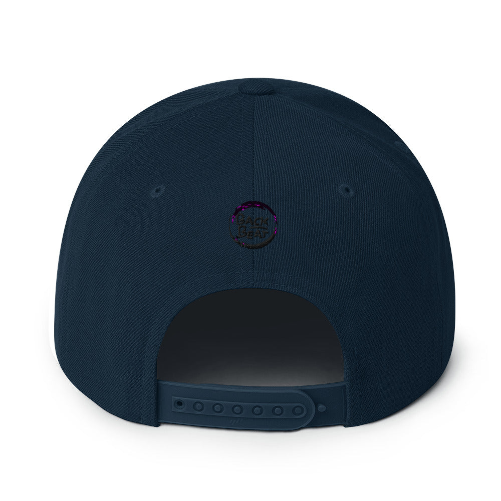 Navy snapback cap with bold glitch-style "No BPM Limit" embroidery in red and blue, designed for electronic music fans and streetwear enthusiasts.t mockup