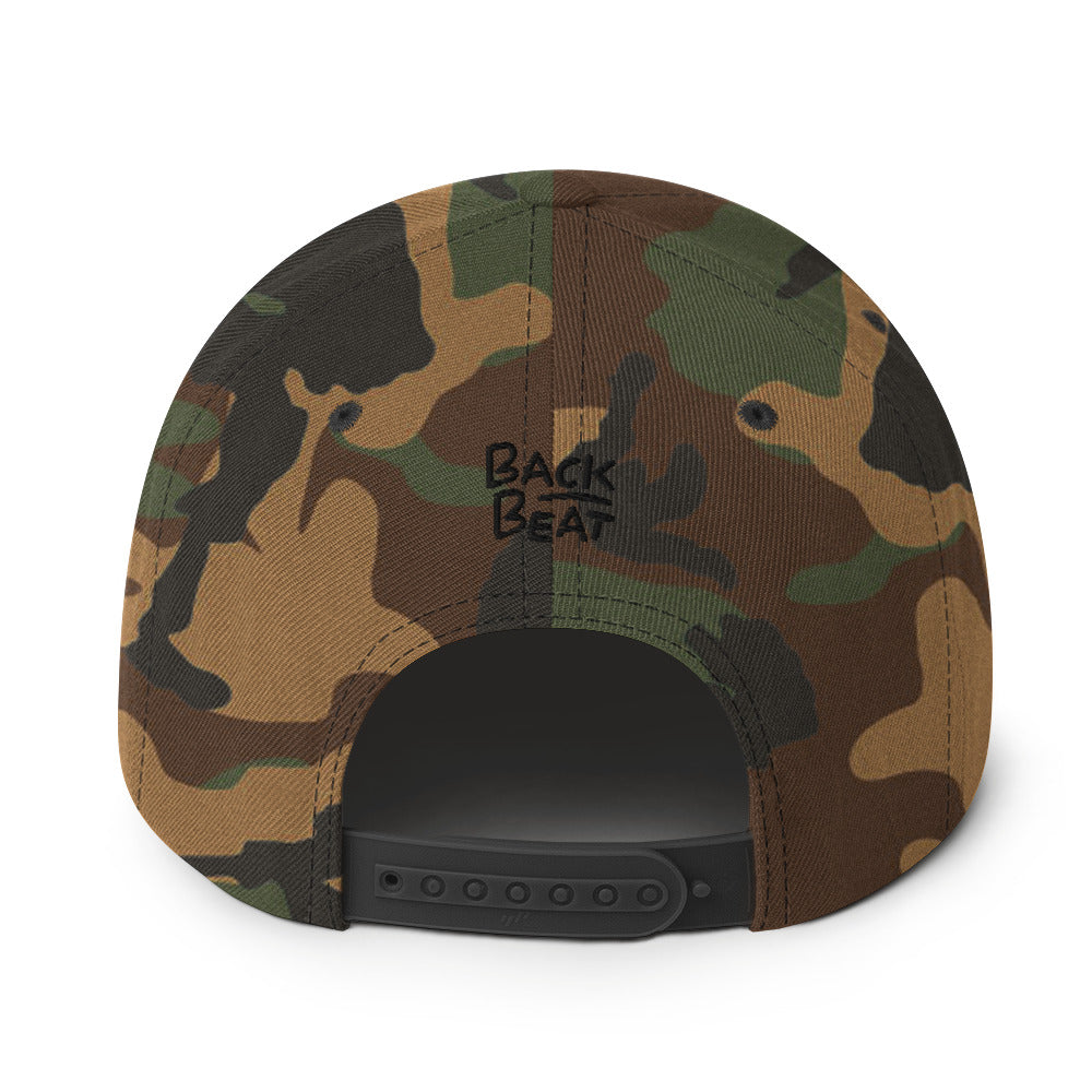 "Whatever" Snapback Hat in camo with bold orange embroidered text, perfect for streetwear fashion.