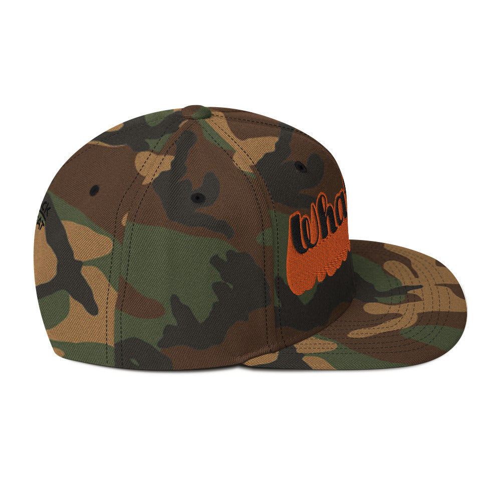 "Whatever" Snapback Hat in camo with bold orange embroidered text, perfect for streetwear fashion.