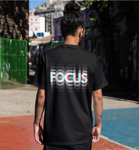 Black T-shirt with bold ‘FOCUS’ design in large white letters and 3D effect in red and blue