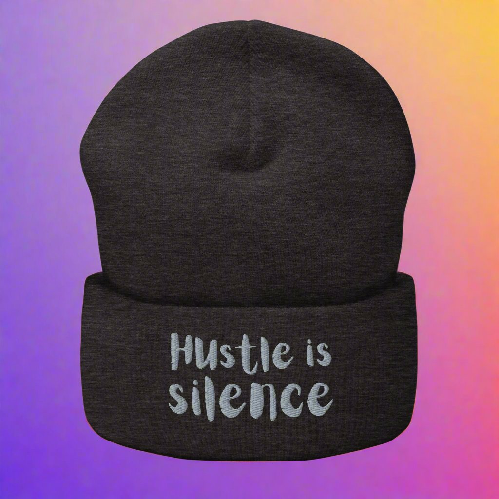 Dark grey beanie with "Hustle is Silence" embroidered text – unisex, streetwear style, hypoallergenic, 12" length