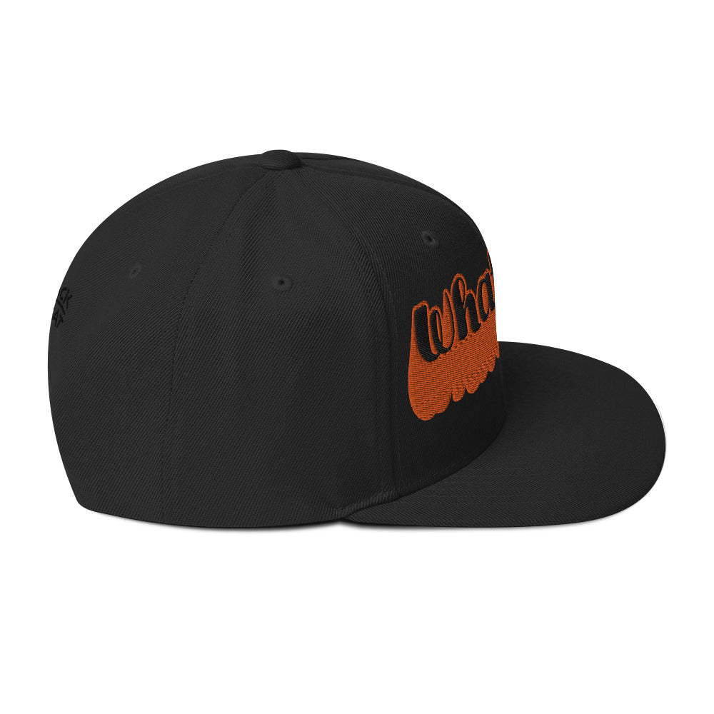 "Whatever" Snapback Hat in black with bold orange embroidered text, perfect for streetwear fashion.